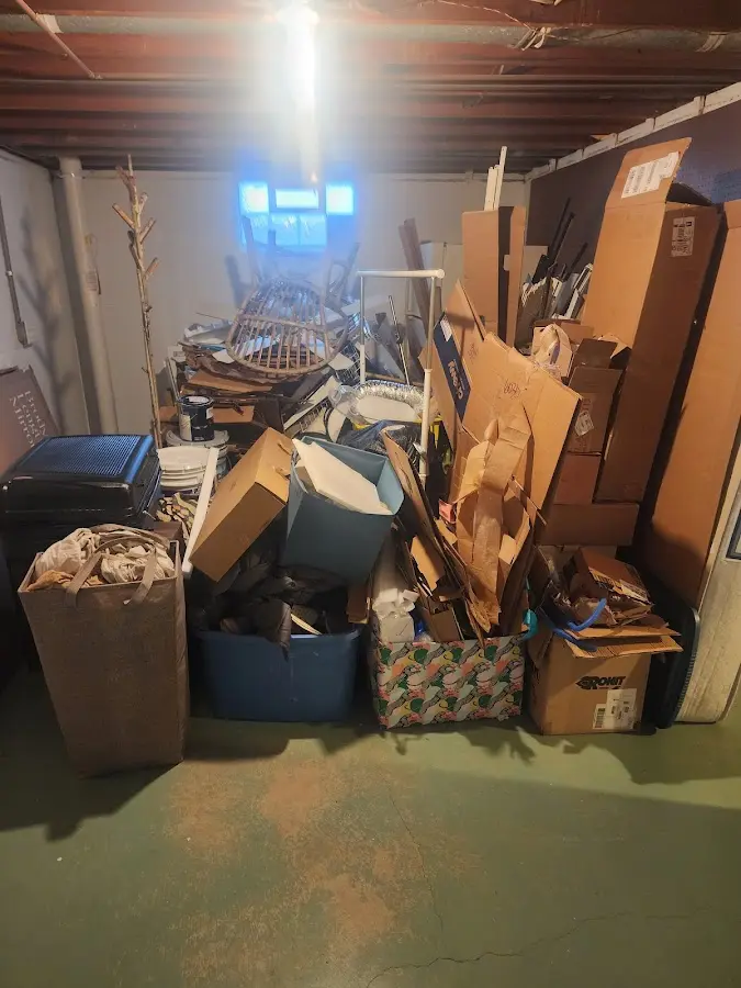 Roll-off dumpster container at job site for 20 Yard Dumpster Rental in Russell